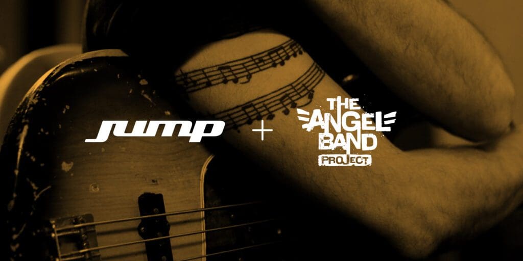 Armband of a music sheet tattoo with Angel Bands Logo